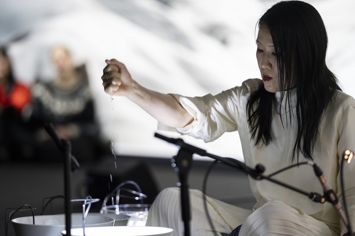 Waterbowls. Sound performance by Tomoko Sauvage, 2025 Courtesy Pirelli HangarBicocca Photo Lorenzo Palmieri