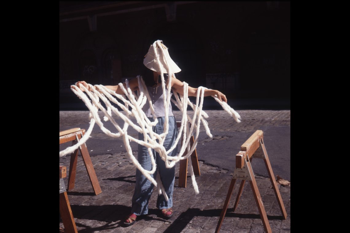 Cecilia Vicuña performance with Cloud-Net, 1999 Courtesy the artist and Lehmann Maupin, New York, Seoul, and London © 2025 Cecilia Vicuña / SIAE